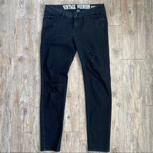 Distressed slim leg jeans size 9